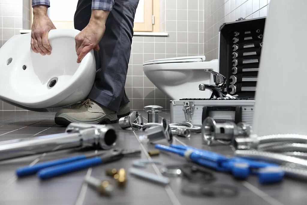 Plumbing tools prepared for a bathroom repair in Palm Beach Gardens